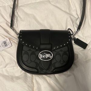 Brand new, never used Georgie Saddle coach purse